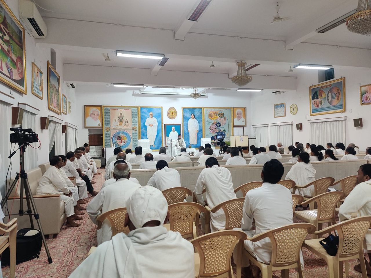 Session in the hall, Madhuban